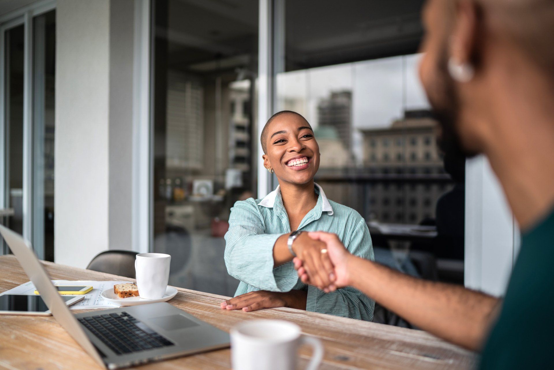 Happy Businesswoman Shaking Hands - Colorado Springs, CO - Busy Bees Professional
