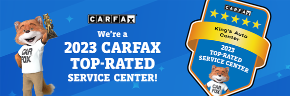 CARFAX banner featuring a cartoon fox character, stars, and text proclaiming the business as a 2023 Top-Rated Service Center. | King's Auto Center