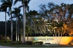 Hotel entry sign and landscaping
