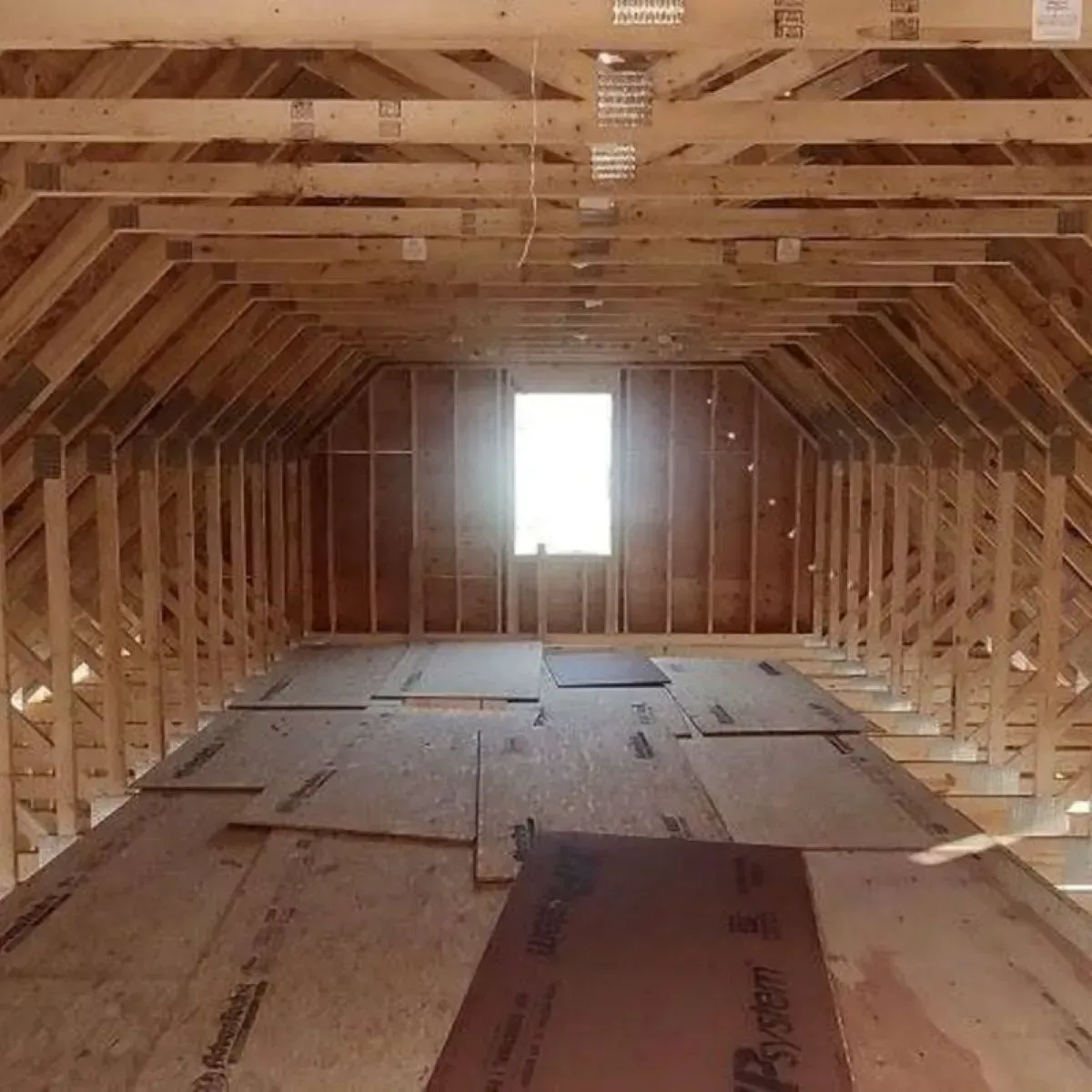 The inside of a building under construction with a window