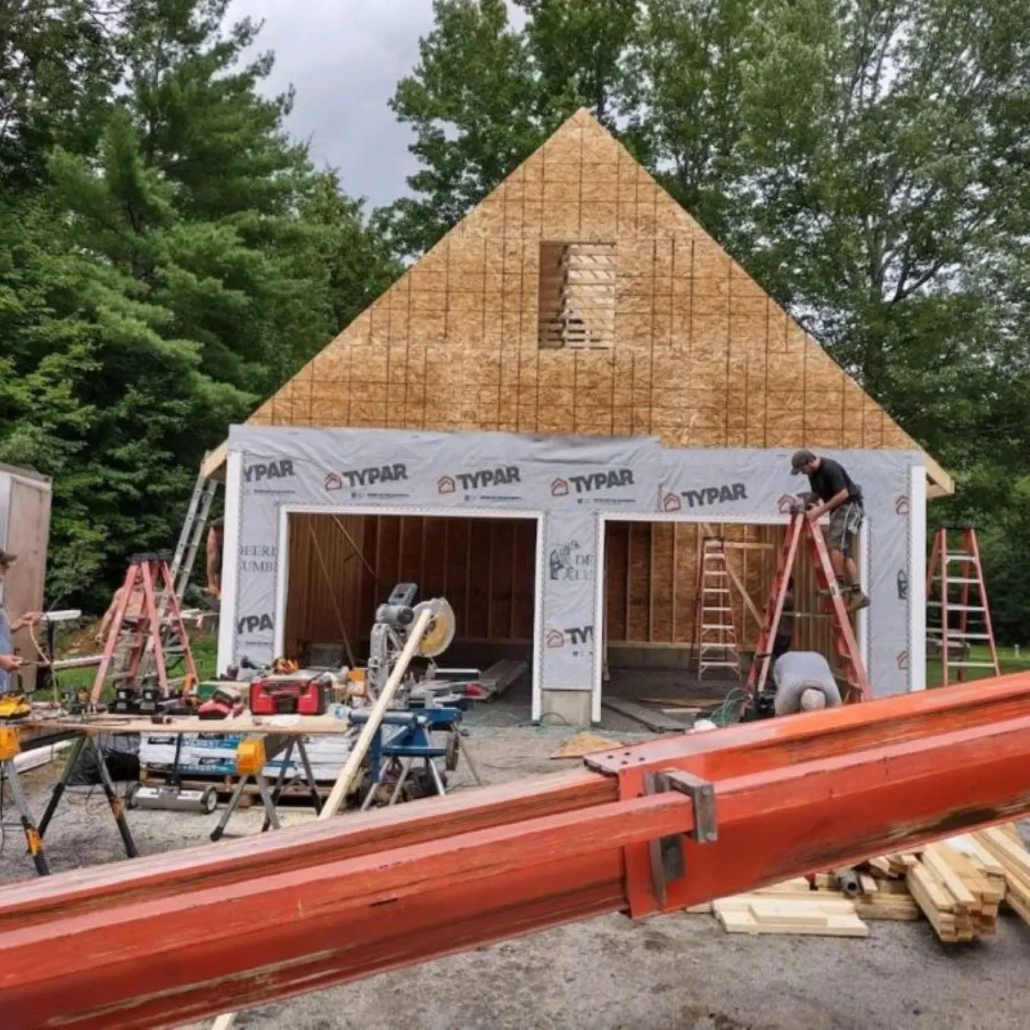 A garage is being built with styrofoam on the roof