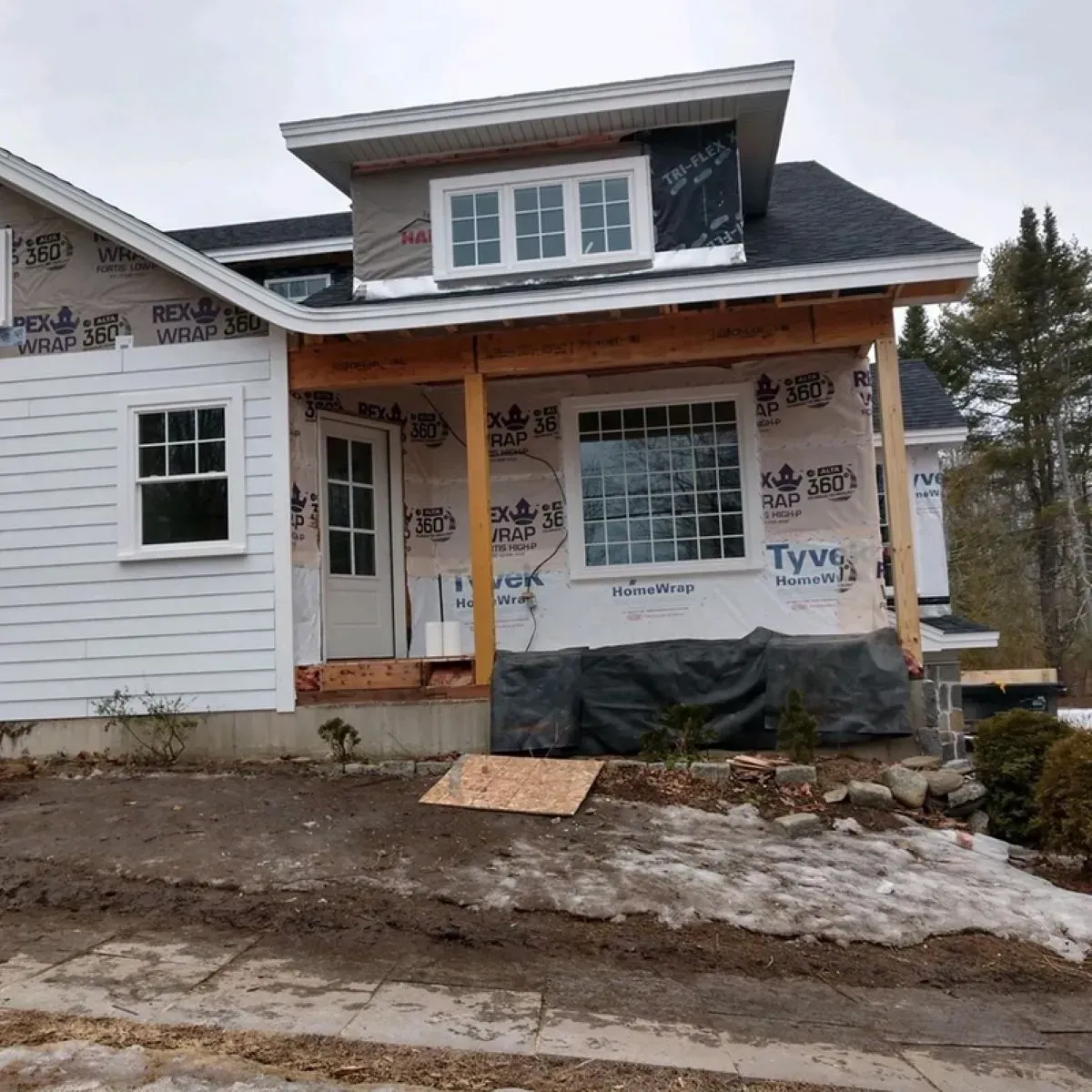 A house under construction with styrofoam on the side