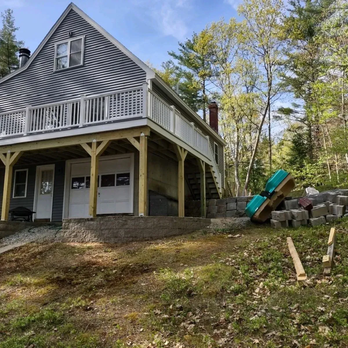 A house with a large deck and stairs
