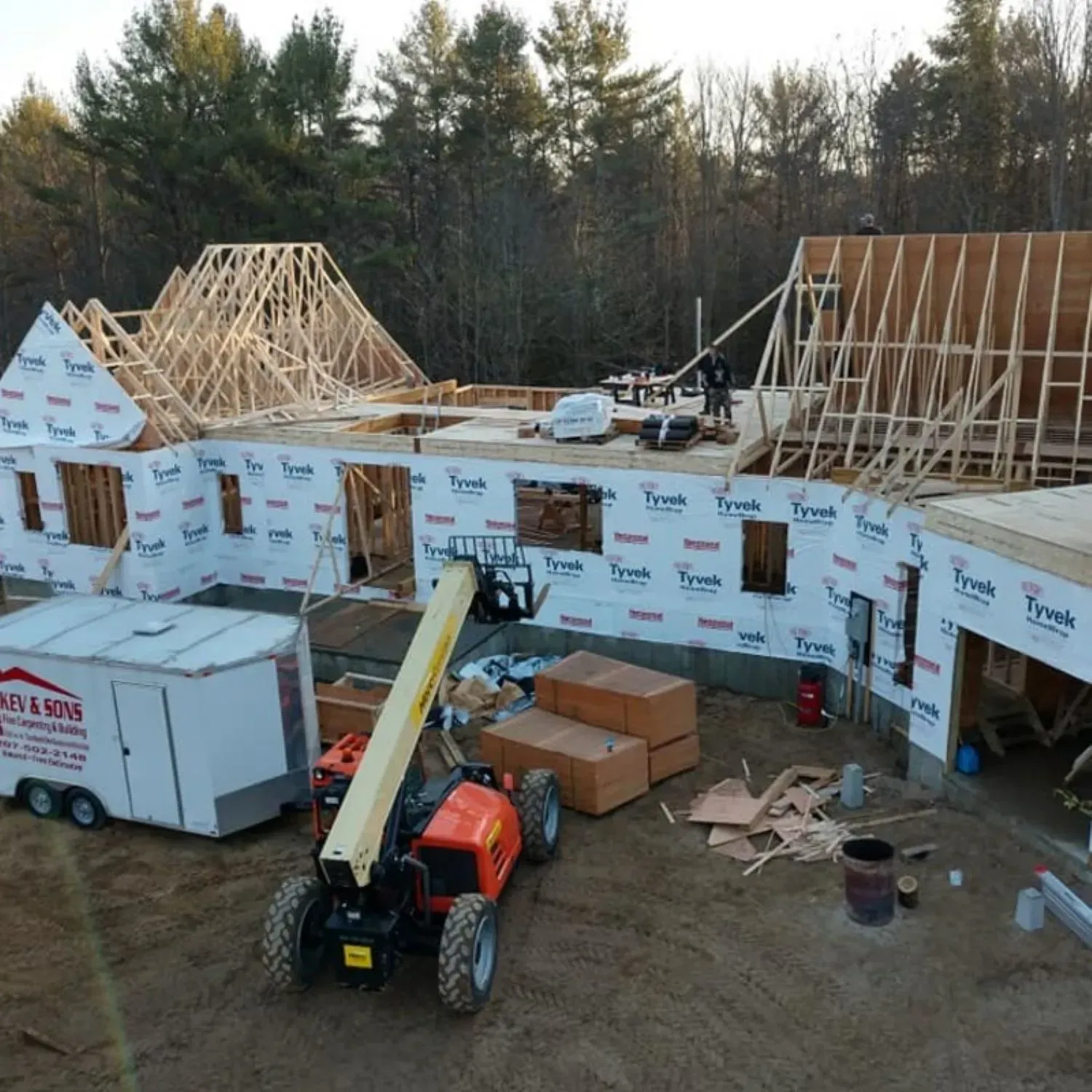 An aerial view of a large house under construction