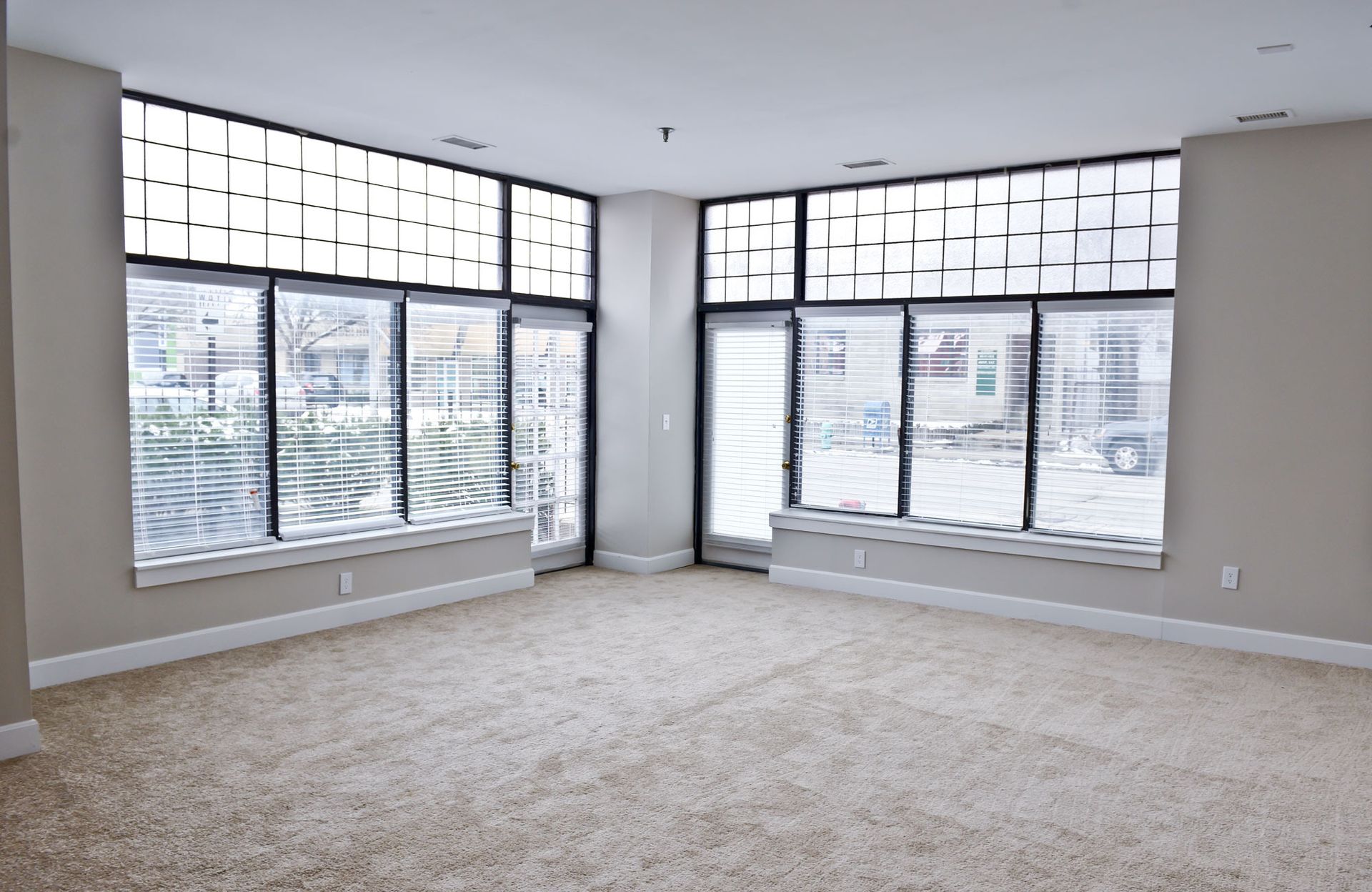 Carpeted living room at Circle City in Indianapolis, IN.