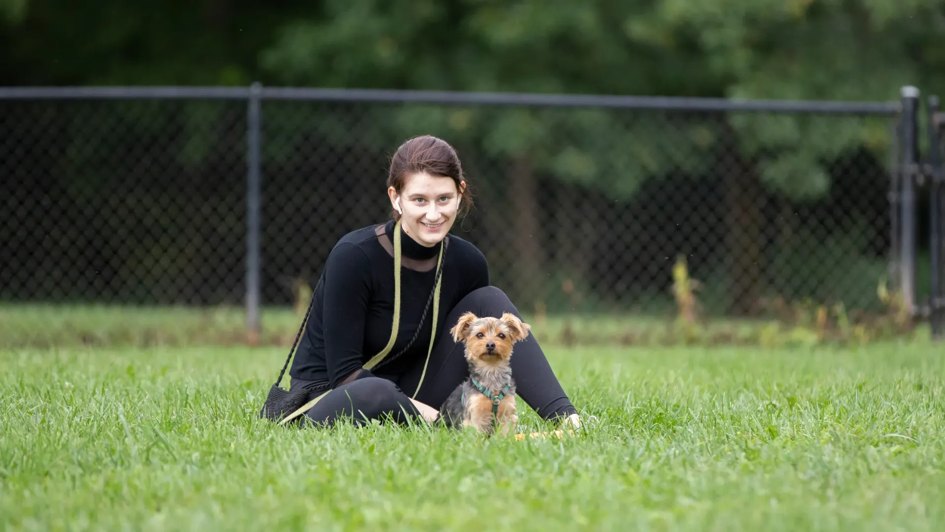 resident in a park with dog