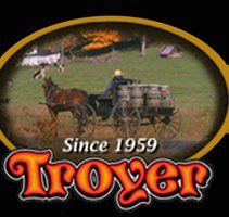 Troyer logo: horse-drawn carriage with barrels, field background,
