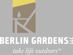Logo for Berlin Gardens with a bird on a structure, and the tagline