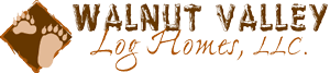 Logo for Walnut Valley Log Homes, LLC, featuring paw prints in a diamond, with text.