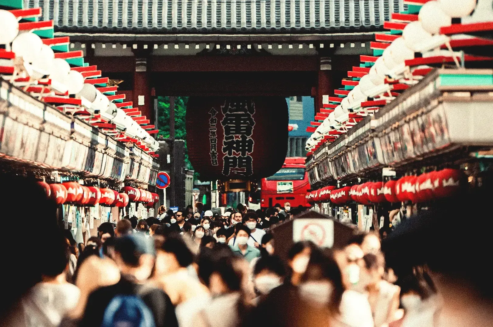 Oriental red lantern decorations over the crowd in Tokyo, Japan