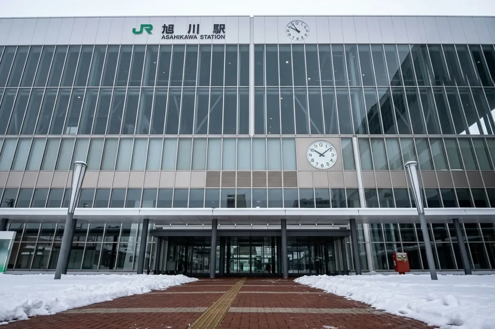 Snowy exterior of JR Asahikawa Station, the gateway to Hokkaido's ramen capital