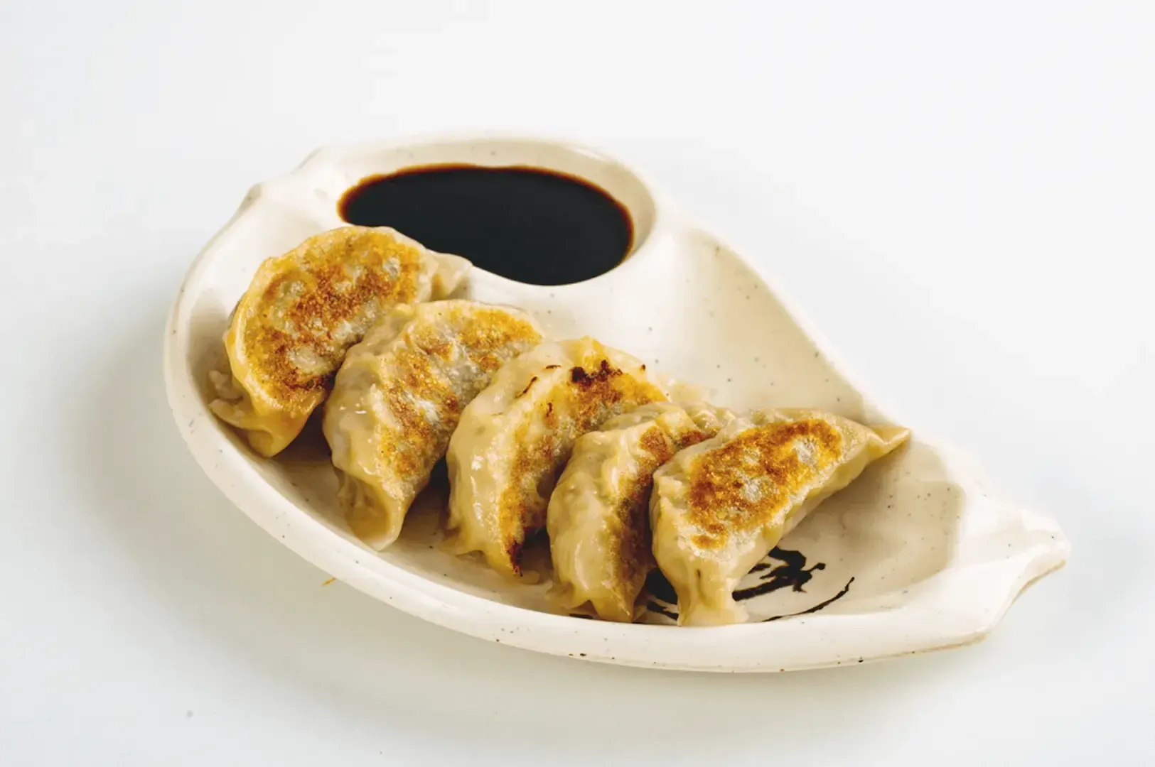 Gyoza served with soy sauce
