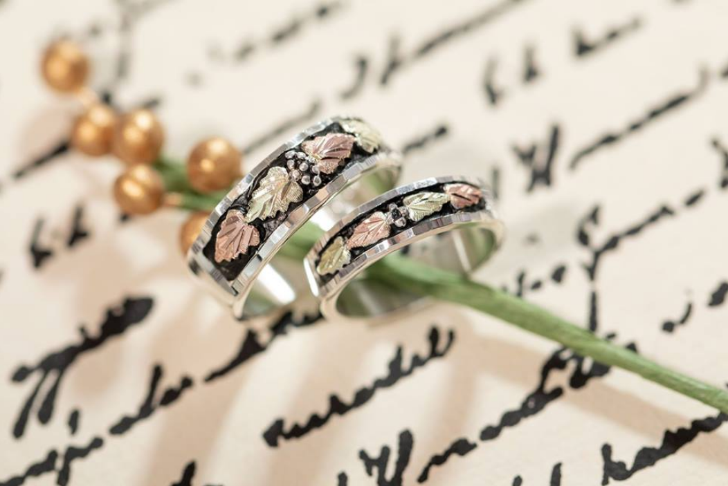 Black antiqued Landstroms Silver his and hers wedding bands