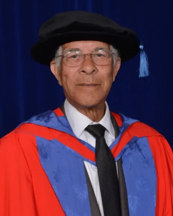 Image of Bert William MBE in his award ceremony robes