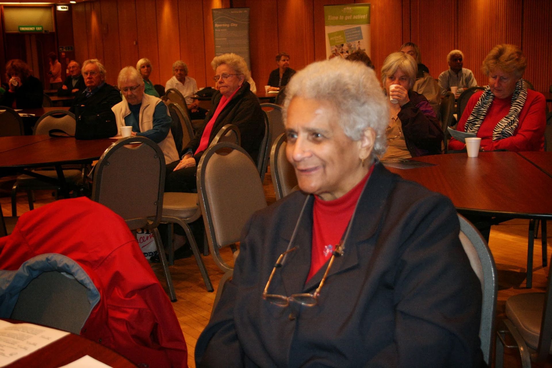 Faith Matyszak-Gander attending a meeting with other local residents.