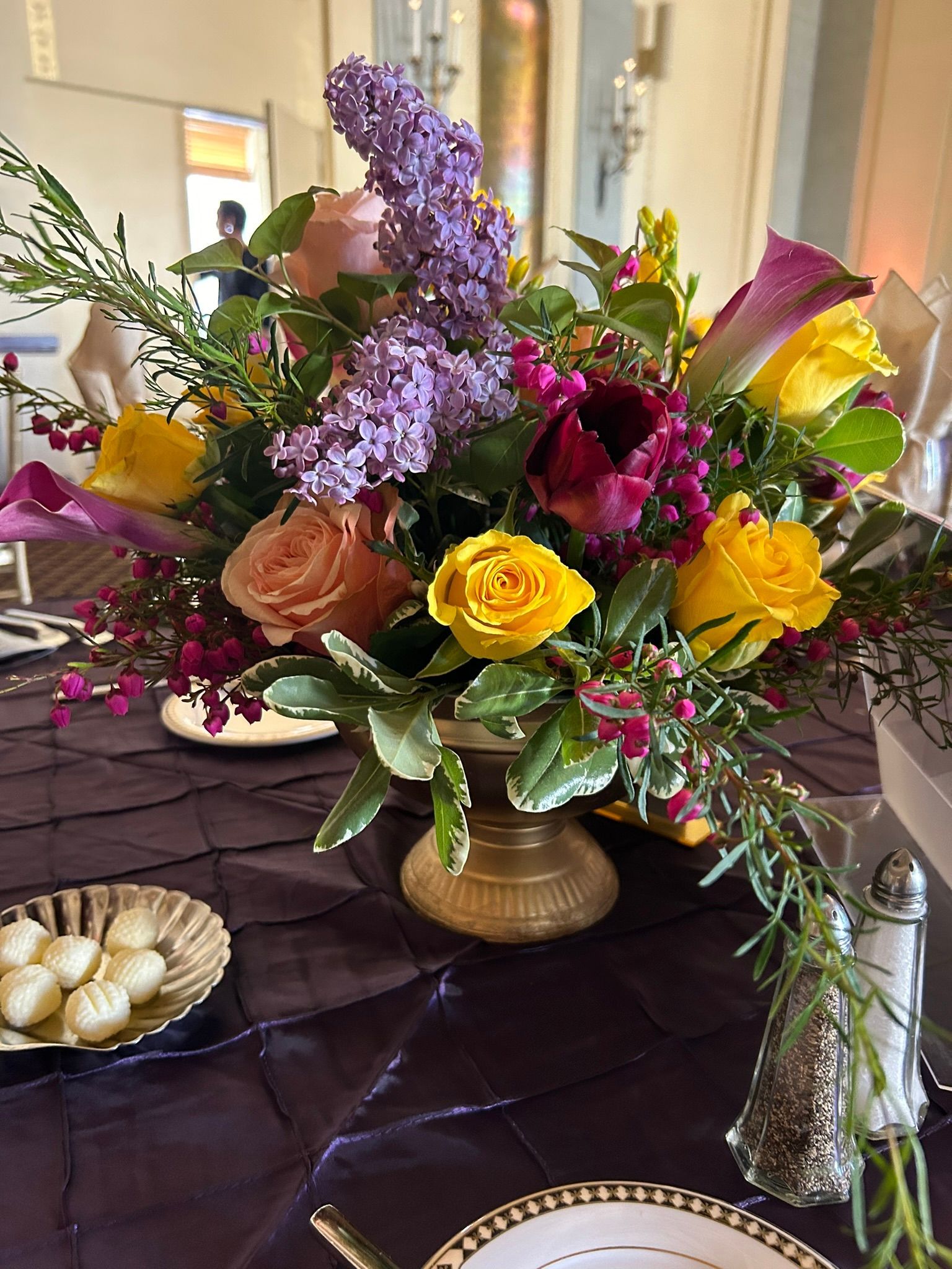 Spring centerpiece in gold vase