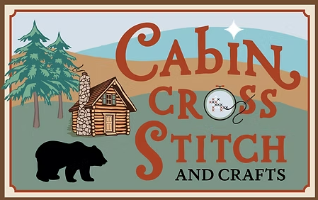 Cabin Cross Stitch and Crafts logo with cabin, trees, bear, and mountains on tan background