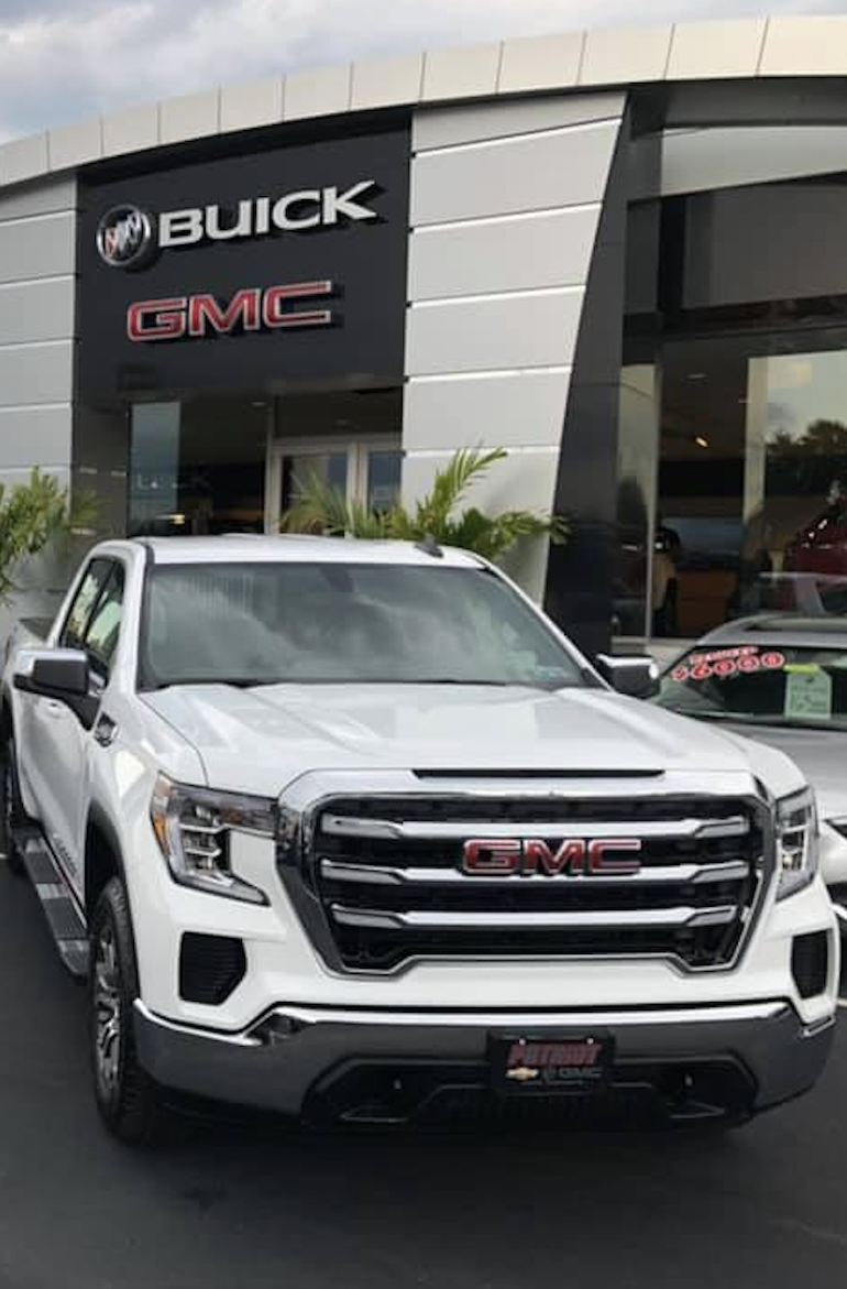 Man sitting at desk with laptop 