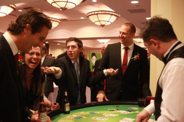 A group of people are playing a game of poker