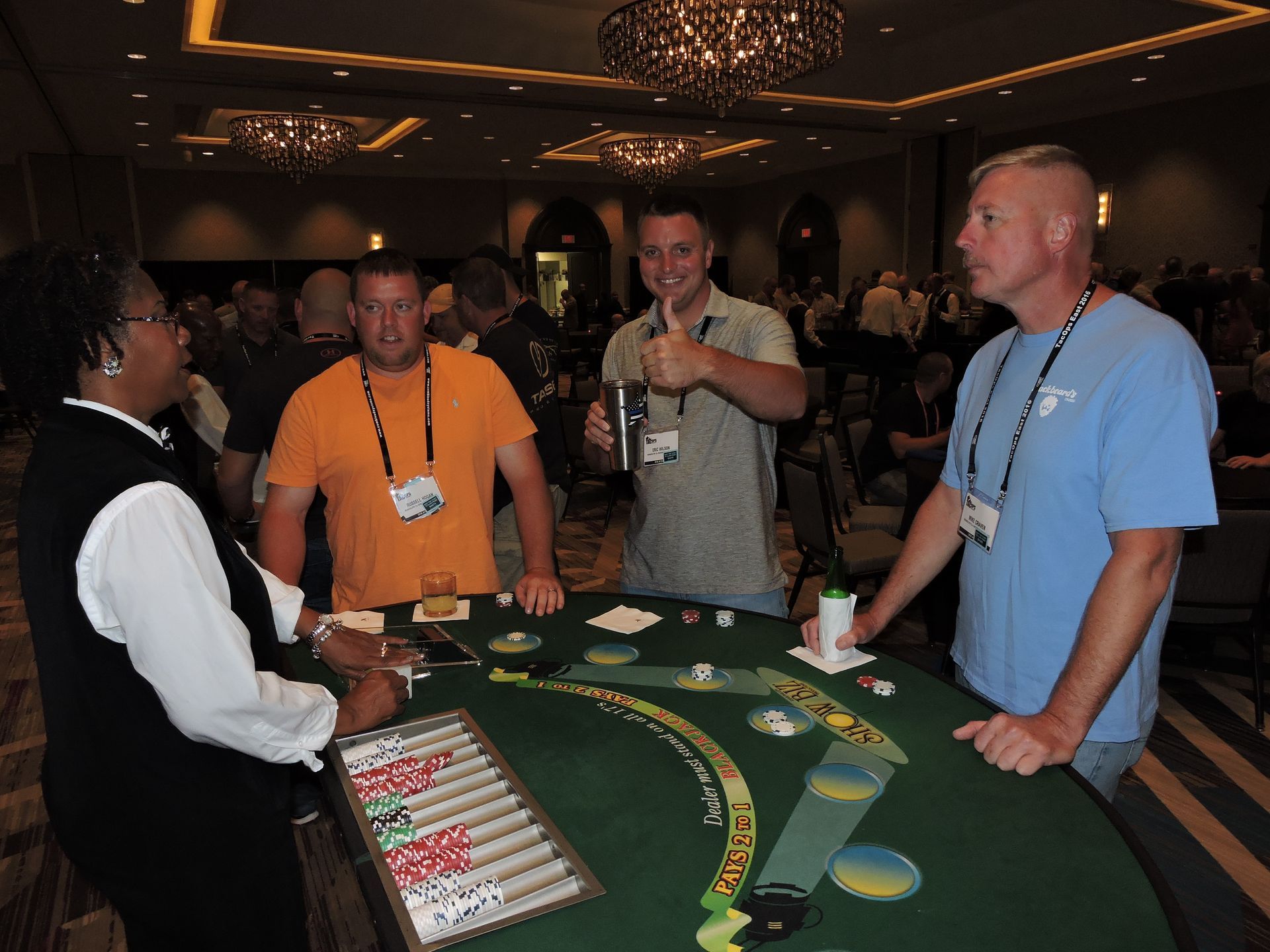 A group of people are playing a game of blackjack