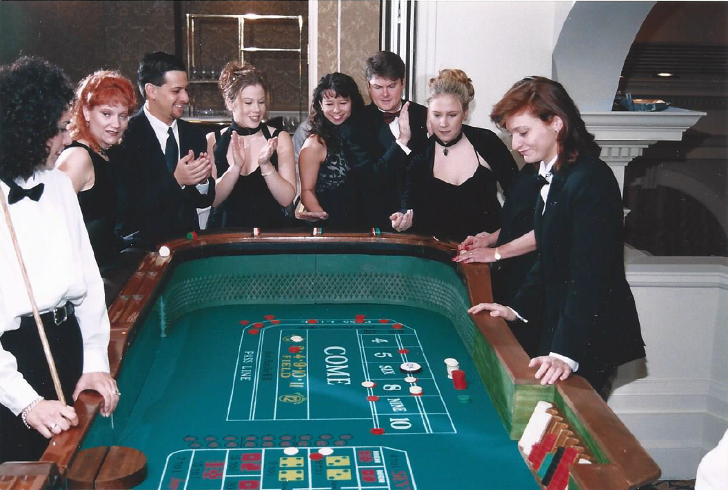 A group of people are playing a game of roulette