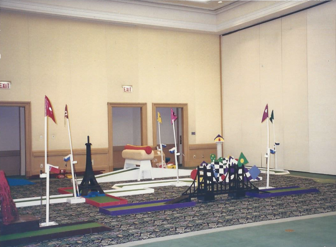 A room with flags and a sign that says exit