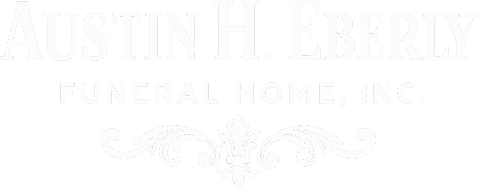 Faded white logo reading &ldquo;Austin Pebble Creek Funeral Home, Inc.&rdquo; with decorative swirl line art