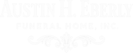 Faded white logo reading &ldquo;Austin Pebble Creek Funeral Home, Inc.&rdquo; with decorative swirl line art