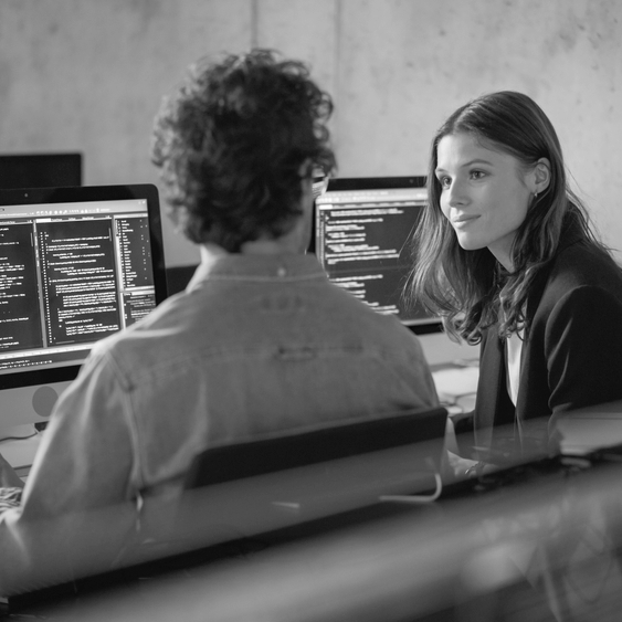 two people talking about ConsultNet's cyber security managed services
