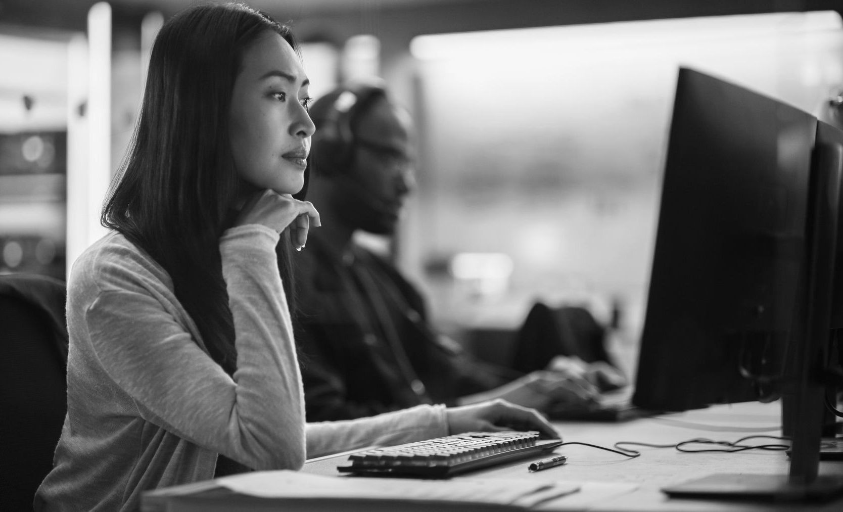 female IT personel researching 2FA benefits