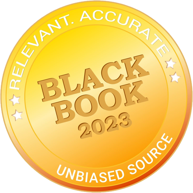A gold circular badge reading 