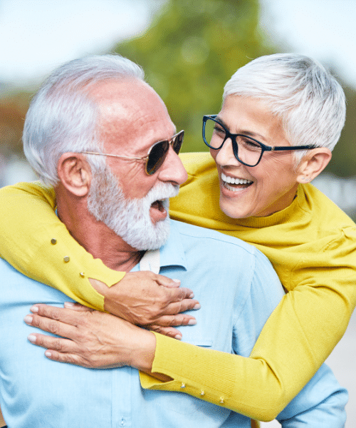 happy senior couple with healthcare insurance Josh Zaid Medicare Strategy New York and Florida