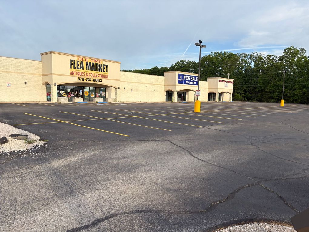 Light poles, bollards and parking stops