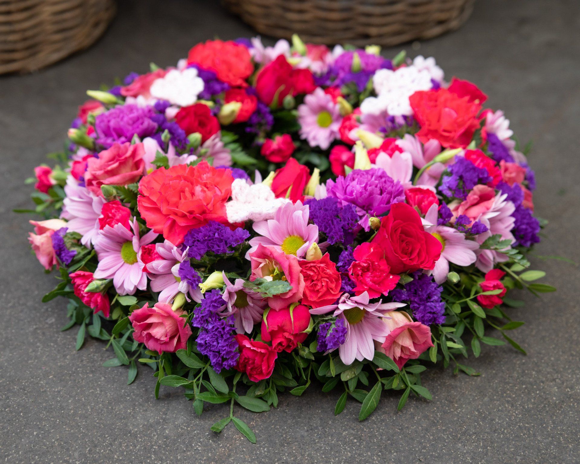 pink red and purple funeral flower Arrangement