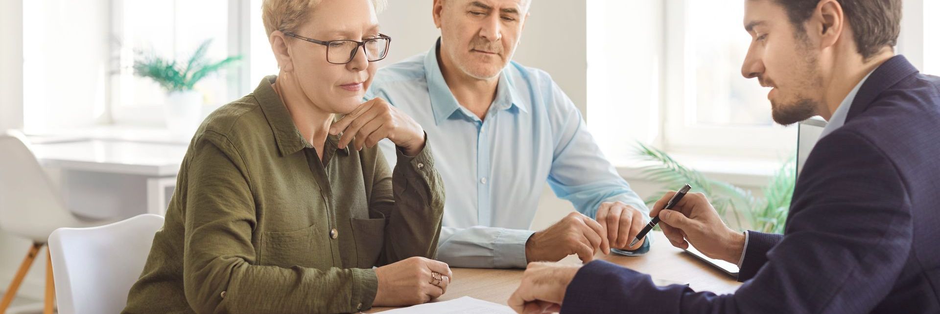 couple discussing with banker
