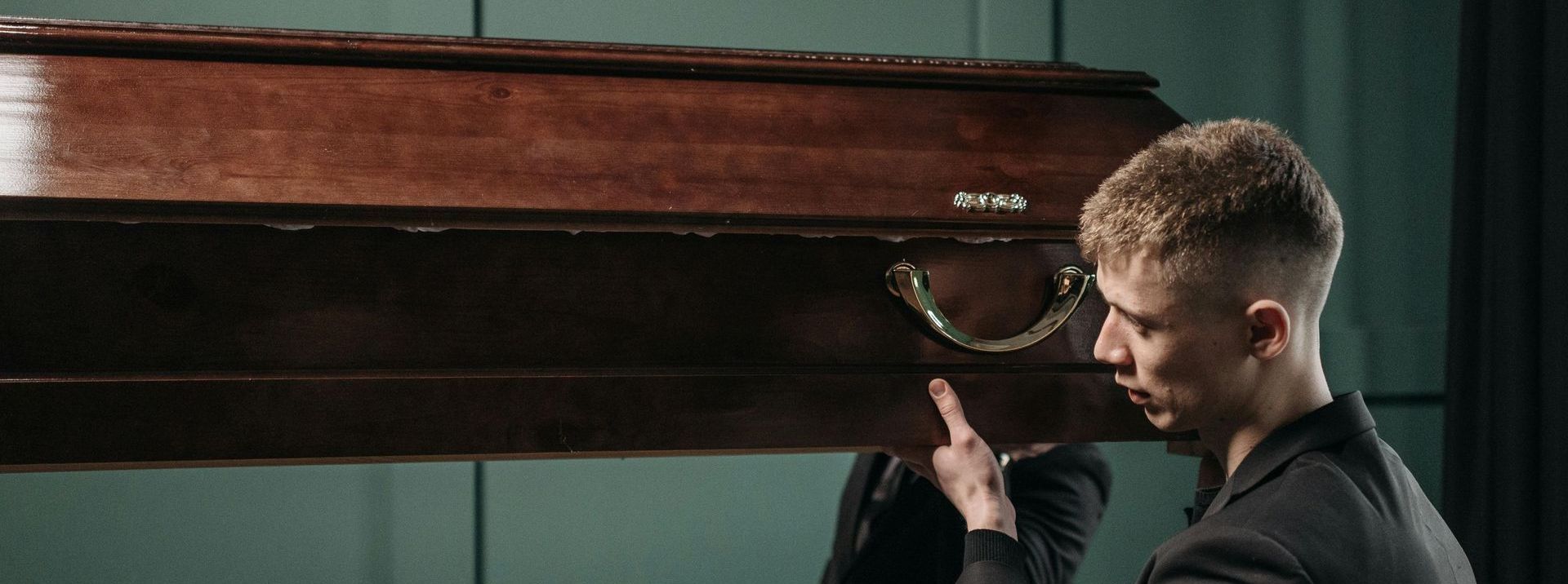 pallbearer carrying the coffin 