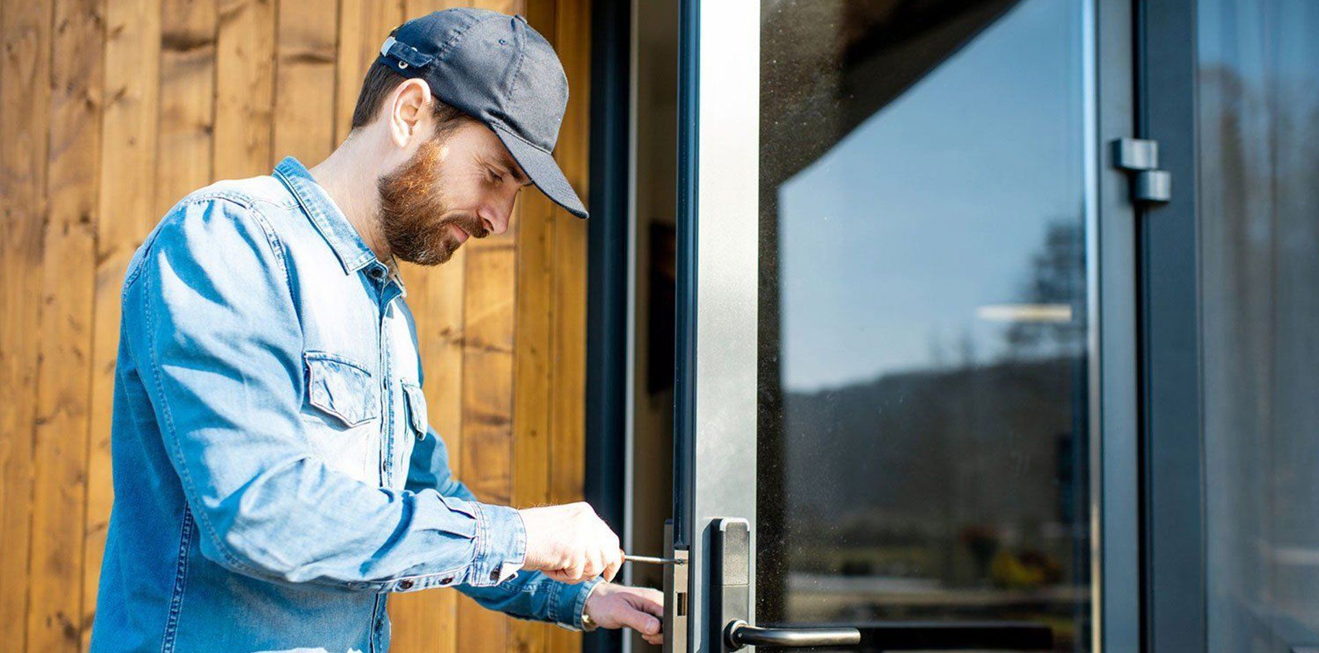 locksmith repairing the door