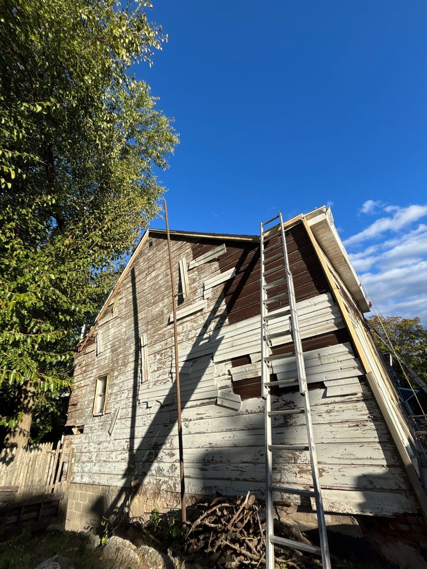 Before siding exterior project by United Roofing and Siding at 11 Cuyler St. Albany, NY