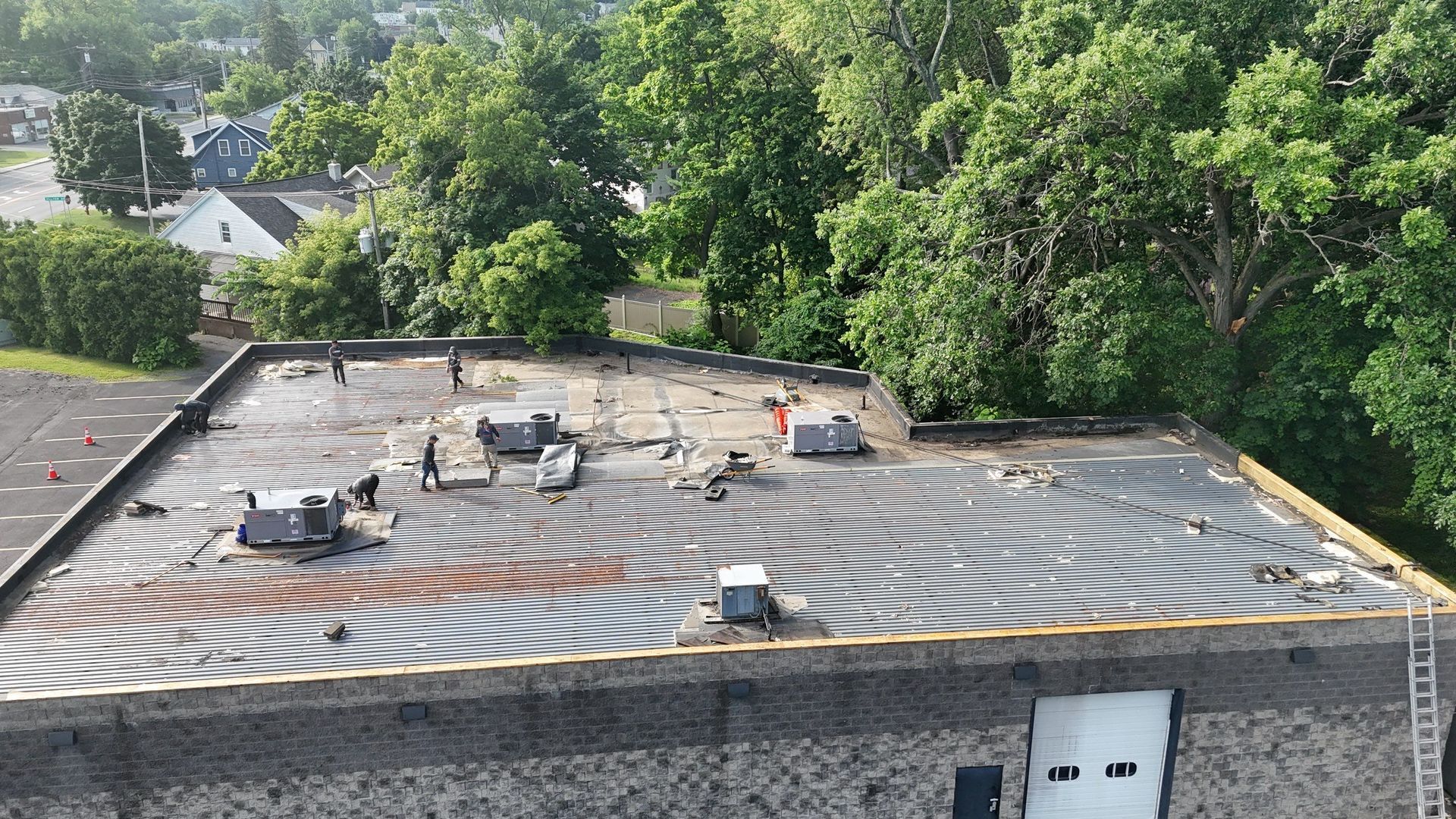 United Roofing & Siding project: 122 Columbia Tpk. Rensselaer Commercial Before