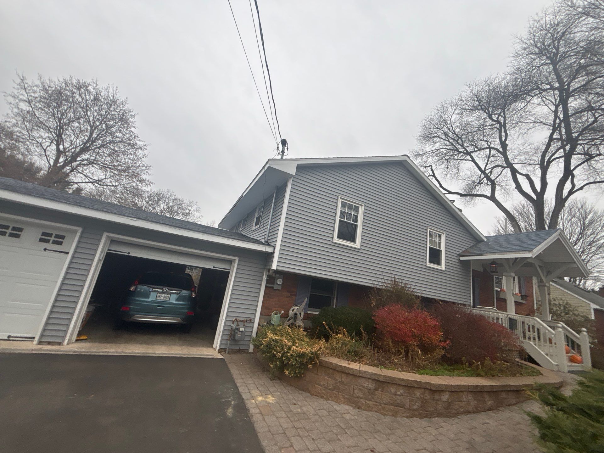 After siding exterior project by United Roofing and Siding at 14 Salem Dr. Saratoga Springs, NY