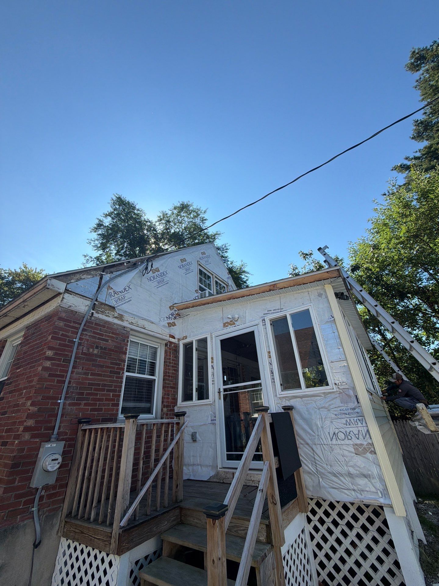 Home before siding project by United Roofing and Siding on Pointview Drive in Troy NY