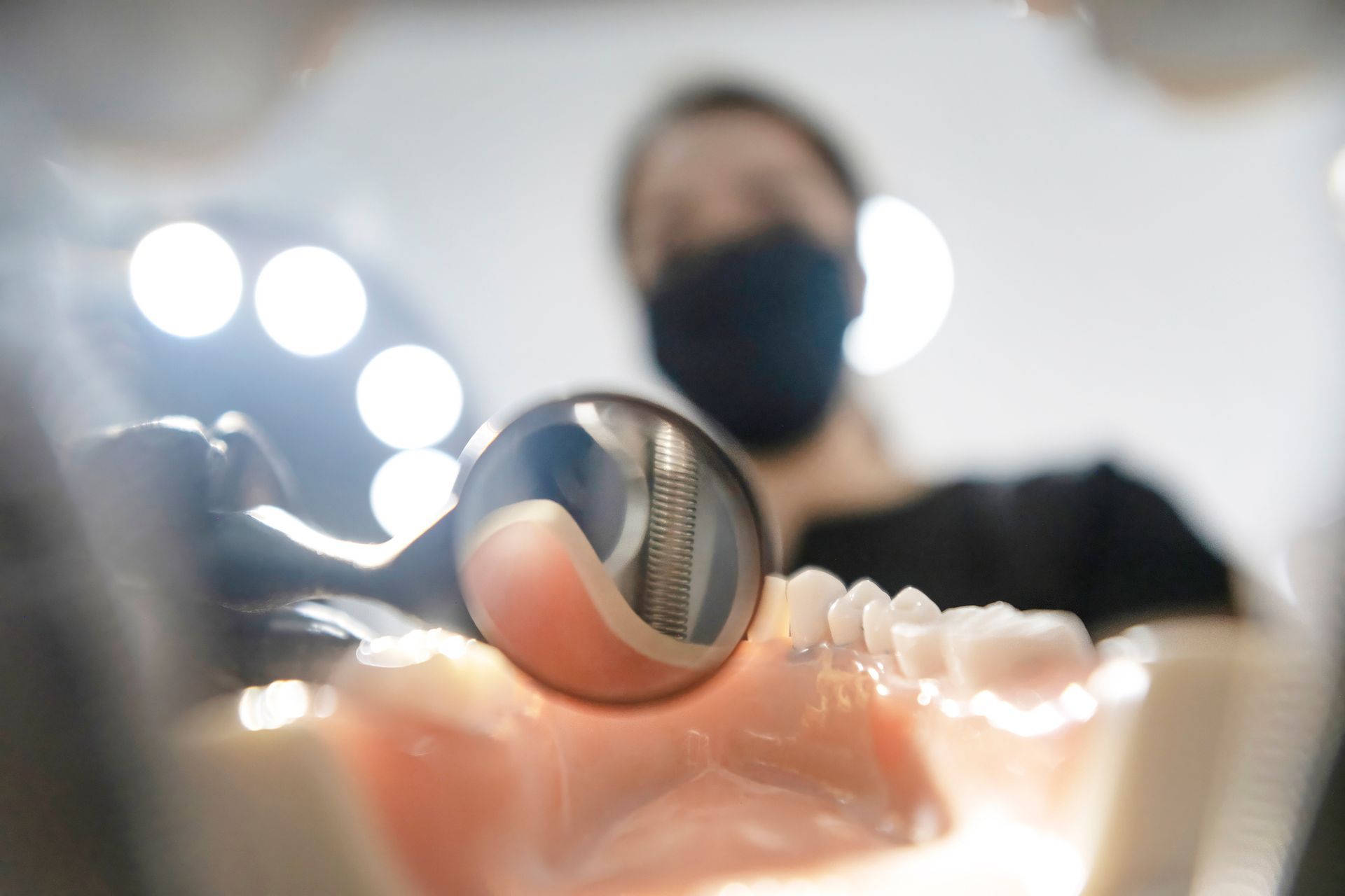 Dentist Examining Patient’s Teeth In Dental Clinic Dentist Examining Patient’s Teeth In Dental Clinic