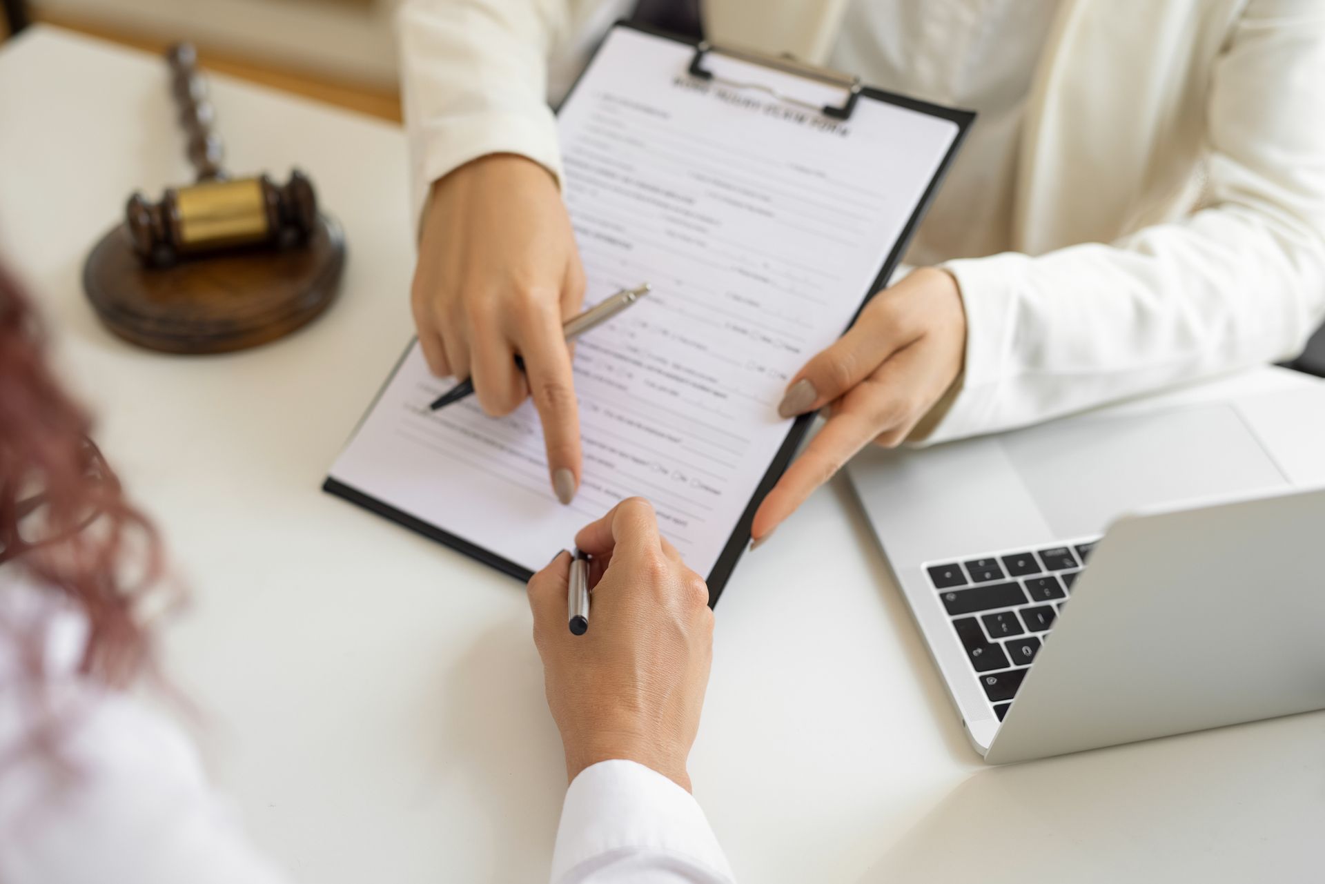 A lawyer is explaining a contract to a client.