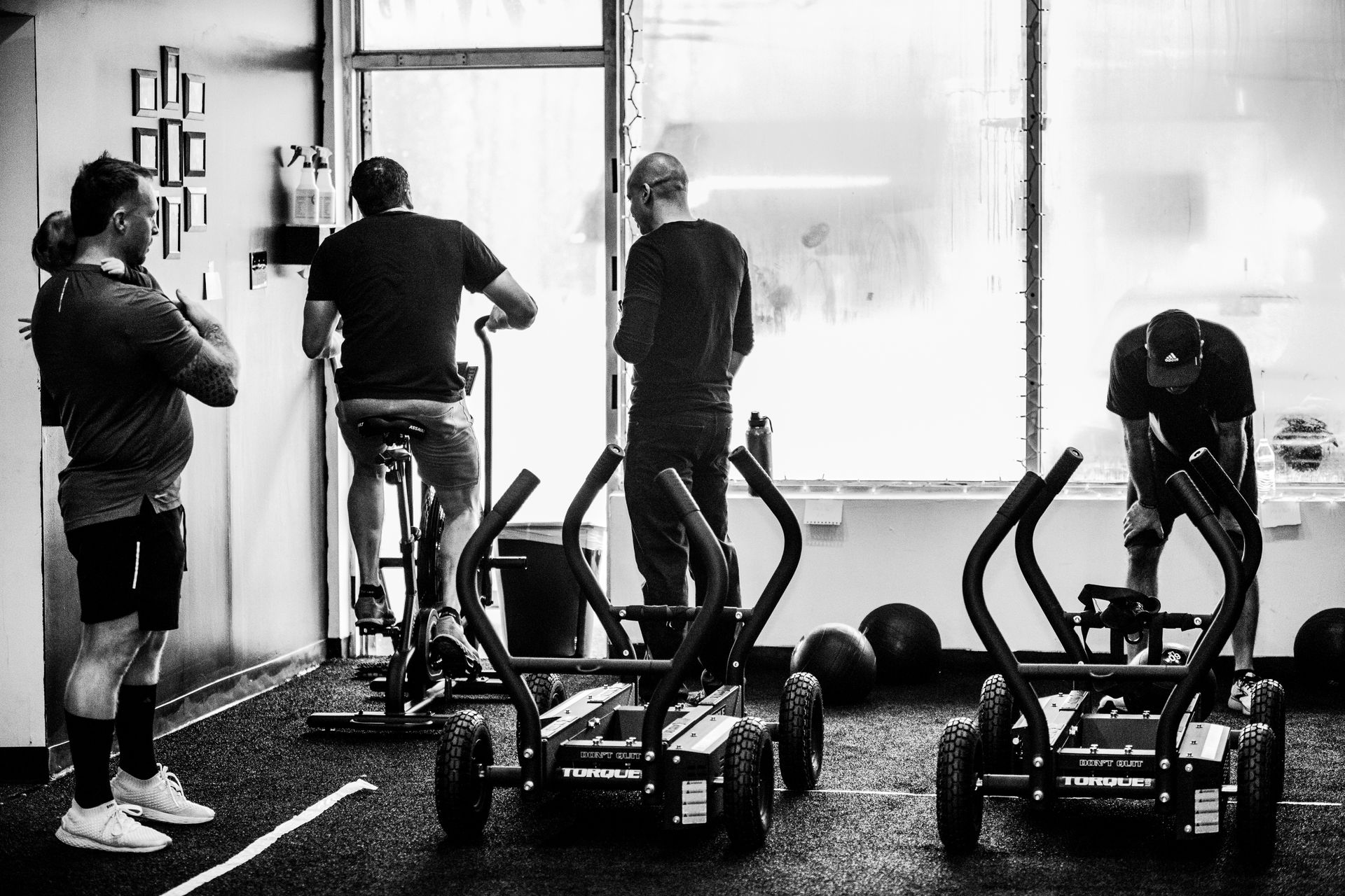 Photorealistic group strength workout in a welcoming gym