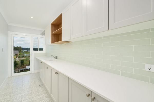 A Kitchen with White Cabinets and White Counter Tops | Mid-North Coast, NSW | BDM Constructions
