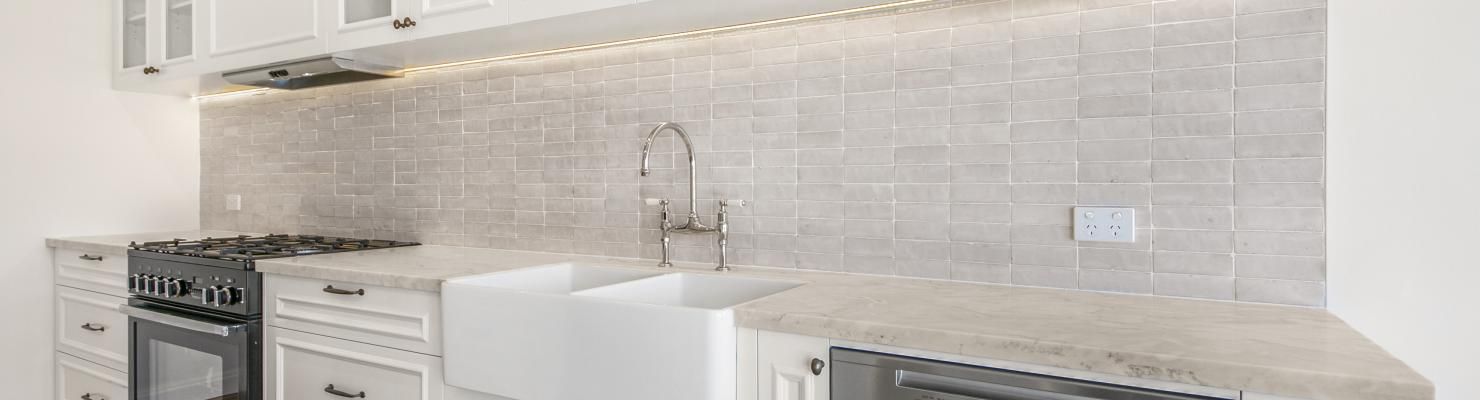 A Kitchen with White Cabinets | Mid-North Coast, NSW | BDM Constructions