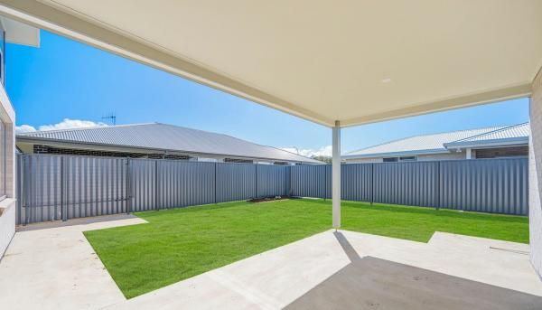 The Backyard of A House with A Fence and A Patio | Mid-North Coast, NSW | BDM Constructions