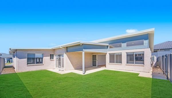 A Large House with A Large Lawn in Front of It | Mid-North Coast, NSW | BDM Constructions