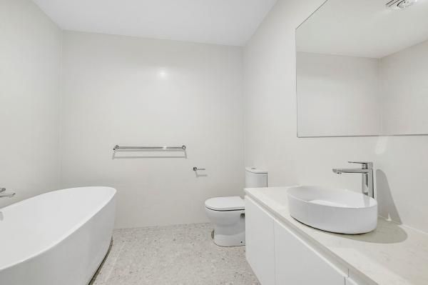 A Bathroom with A Bathtub , Toilet , Sink and Mirror | Mid-North Coast, NSW | BDM Constructions