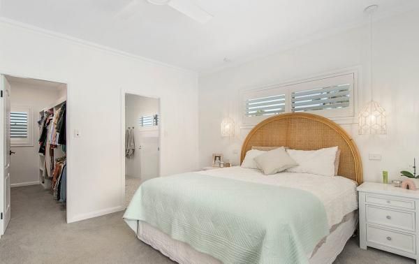 A Bedroom with A King Size Bed and A Walk in Closet | Mid-North Coast, NSW | BDM Constructions